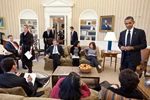 Valerie Prints: President Obama's staff carry in their chairs before an Oval Office meeting