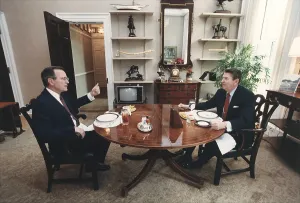 Vice Presidents Prints: President Reagan and Vice-President Bush eating lunch in the Oval Office Study