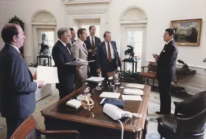 West Wing Prints: President Reagan and his White House staff discussing the assassination of Egyptian President Anwar Sadat