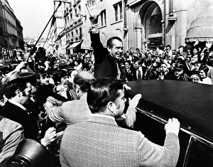 Travel Prints: President Richard Nixon waves to cheering spectators in Paris