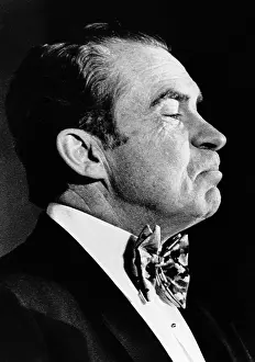 Holidays Prints: President Richard Nixon wearing a green satin oversized bow tie in honor of St