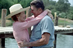 Presidents Wives Prints: President Ronald and Nancy Reagan in an affectionate pose at their Santa Barbara