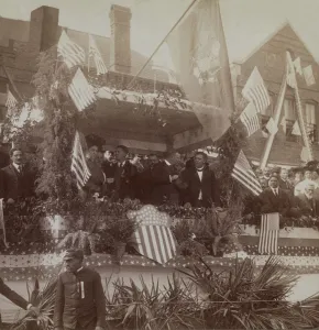 Parade Prints: President Theodore Roosevelt and Booker Washington watching a parade at the Tuskegee Institute