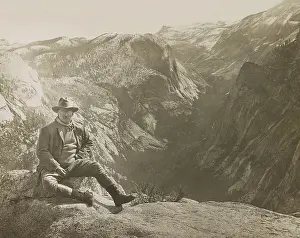 Retreat Prints: President Theodore Roosevelt sitting on large stone