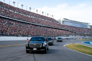 Automobiles Prints: The President Trump's limousine leads the ceremonial first lap of the NASCAR Daytona 500 Race