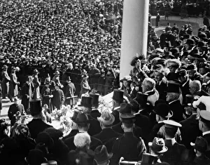 Inauguration Prints: President Warren Harding waving to crowd from inaugural stand on East Portico of U