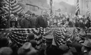 1900 1910 Prints: President William Taft (1857-1930) speaking on a flag draped podium in 1909