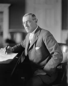 Woodrow Prints: President Woodrow Wilson, seated at his desk in the Oval Office
