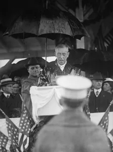 Cabinet Prints: President Woodrow Wilson speaking under an umbrella on Flag Day