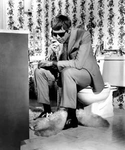 Talking On Phone Prints: THE PRESIDENT'S ANALYST, James Coburn, 1967