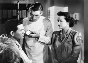 Blind Prints: PRIDE OF THE MARINES, from left: John Garfield, Rory Mallinson, Rosemary DeCamp, 1945