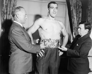 Bare Chested Prints: Primo Carnero, wearing World's Heavyweight Championship belt, Oct. 13, 1933