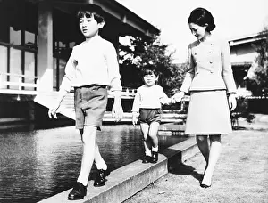 Pool Prints: Princess Michiko, walking with her two sons, Prince Hiro and Prince Aya. Oct. 25, 1968
