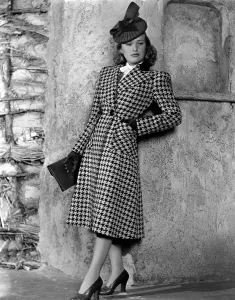 Coat Prints: Priscilla Lane modeling houndstooth coat, 1939