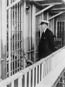 Guard Prints: A prison guard at the Cook County jail standing outside the cell of confessed thrill murder Nathan Leopold