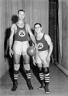 Tall Prints: Professional basketball player Joe Lapchick (left)