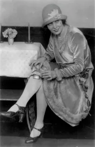 Secret Prints: Prohibition, Miss Rhea seated with flask in garter on leg
