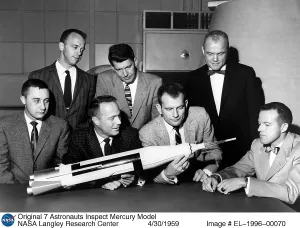 Space Crafts Prints: Project Mercury astronauts inspect Mercury model after they were introduced to the American public in April 1959