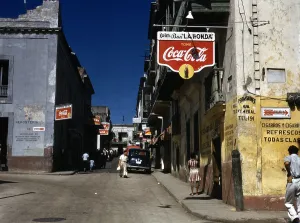 Coca Cola Prints: Puerto Rico. Street in San Juan, Puerto Rico. Photograph by Jack Delano, 1941