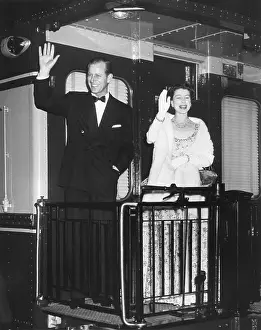 Diamonds Prints: Queen Elizabeth II and Prince Philip wave from the back of a train at Union Station