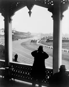 Lcgr1308 Prints: Race horses rounding the bend during race at the Pimlico Track