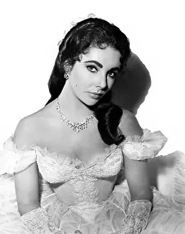 Jsx 73 Prints: RAINTREE COUNTY, Elizabeth Taylor (in a gown by Walter Plunkett), 1957