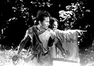 Holding Arm Prints: RASHOMON, from left: Toshiro Mifune, Machiko Kyo, 1950