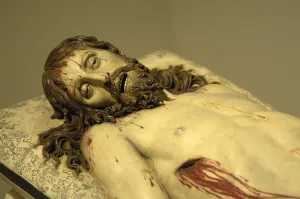 Bloody Prints: Reclining Christ. Polychrome sculpture by Gregorio Fernandez