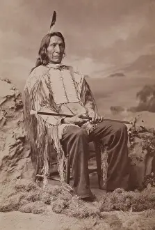 Signer Prints: Red Cloud wears a traditional costume, ca. 1880