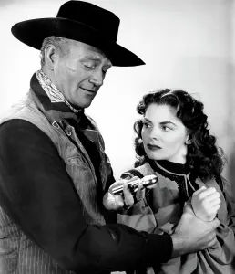 Holding Arm Prints: RED RIVER, John Wayne, Joanne Dru, 1948