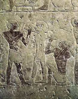 Egyptian Empire Prints: Relief depicting two sculptors carving a statue