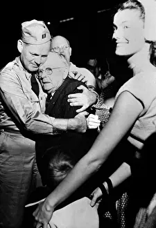 Freed Prints: Repatriated POW Capt. Frederick Smith is greeted by his father on Sept