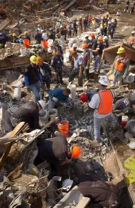Skyscraper Prints: Rescue workers clear the rubble of the World Trade Center one bucket at a time