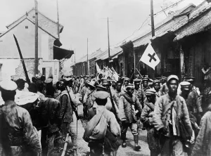 Lcgr1308 Prints: Retreating Chinese Nationalist soldiers entering the city of Tai-an