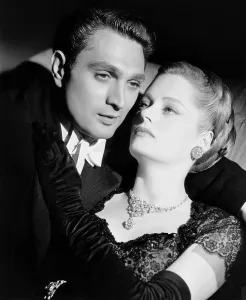 Alexis Prints: RHAPSODY IN BLUE, from left, Robert Alda, Alexis Smith, 1945