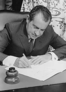 Legislation Prints: Richard Nixon signing a bill into law. Ca. 1969-74