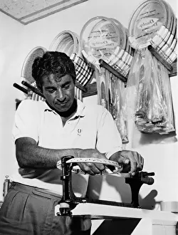 Tennis Prints: Richard Pancho Gonzales restringing a tennis racket in 1962
