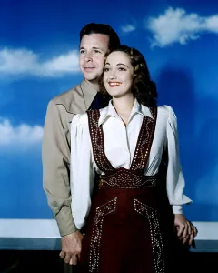 August Prints: RIDING HIGH, from left, Dick Powell, Dorothy Lamour, 1943
