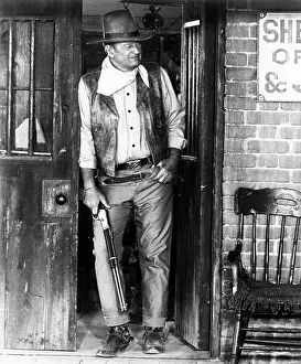 Shotgun Prints: RIO LOBO, John Wayne, 1970.. Courtesy: CSU Archives / Everett Collection