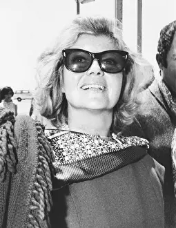 Airport Prints: Rita Hayworth arrives at Rome's Fiumicino Airport in July 17