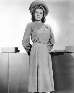 Looking Into Camera Prints: Rita Hayworth, Warner Bros. portrait in a beige wool coat designed by Orry-Kelly