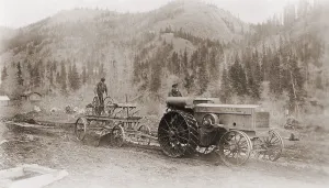 Construction Prints: Road grader pulled by a steel wheeled tractor in Alaska's Tanana Valley in 1916