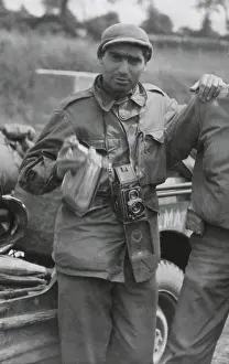 Reporters Prints: Robert Capa, in France while on assignment photographing for Life Magazine in World War 2 France