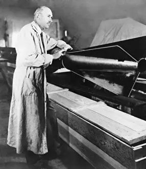 Lcgr1502 Prints: Robert Hutchings Goddard assembling a rocket with tail-fins