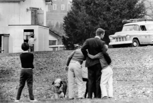 Mclean Prints: Robert Kennedy is comforted by two of his children on the lawn of his Hickory Hill home after he had been notified of