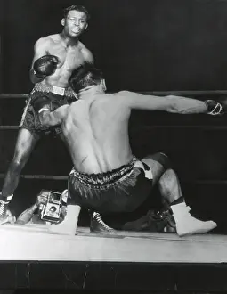 World Champions Prints: Robert Villemain, goes down from a punch by Sugar Ray Robinson in the 12th round