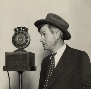 Broadcast Prints: Will Rogers, American humorist, at a radio microphone, ca. 1930. (BSLOC_2013_9_11)