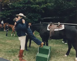 Conservatives Prints: Ronald Reagan affectionately assists First Lady Nancy Reagan during horseback riding at the Maryland Presidential