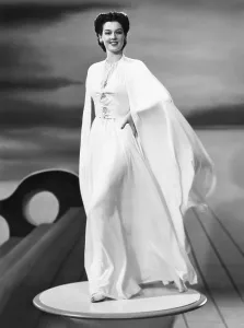 Cape Prints: Rosalind Russell in an evening dress and cape designed by Valentina, 1941