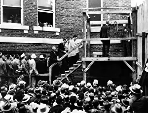 Hanged Prints: Roscoe Red Jackson (behind priest) walks up the steps before he is hanged